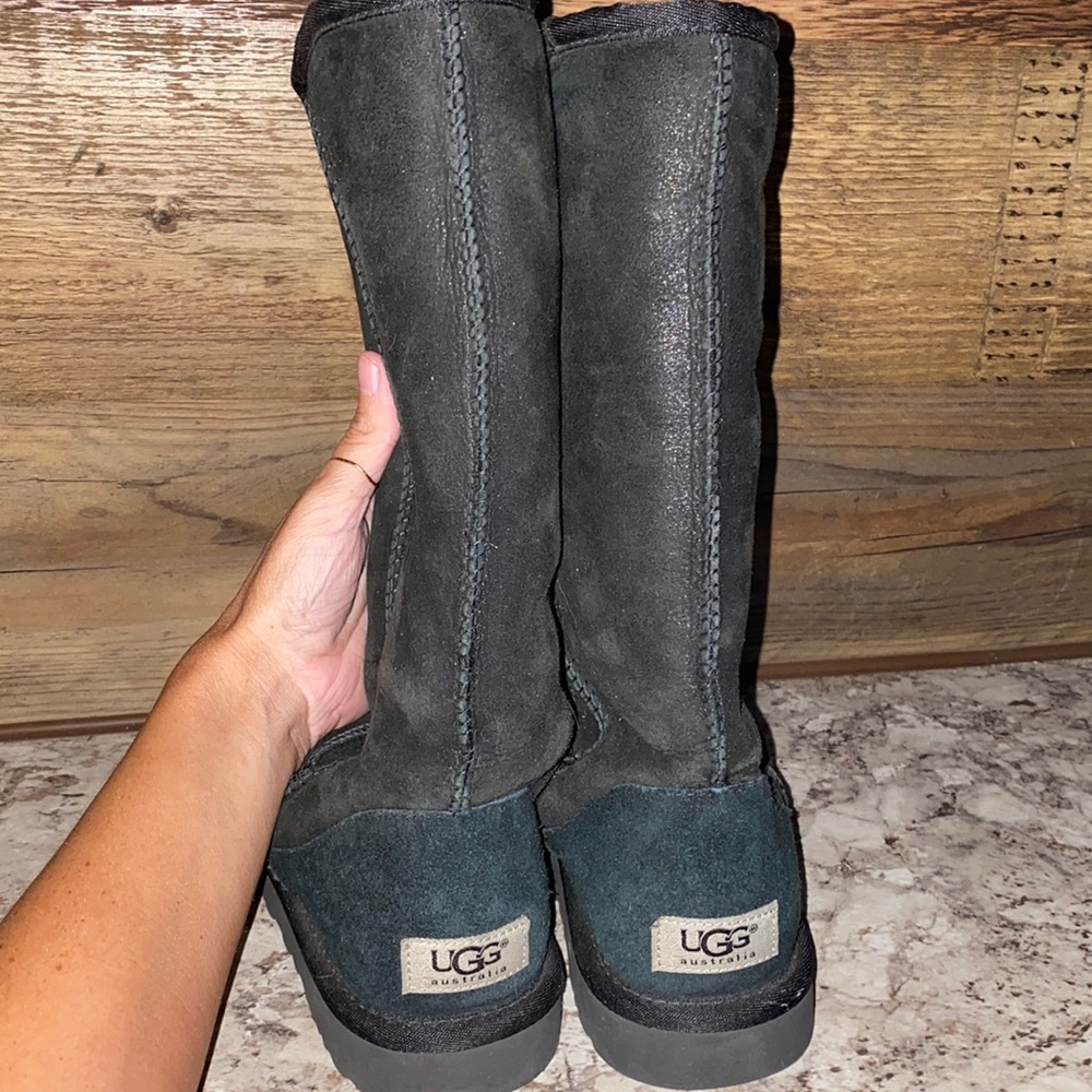 Black tall Ugg boots